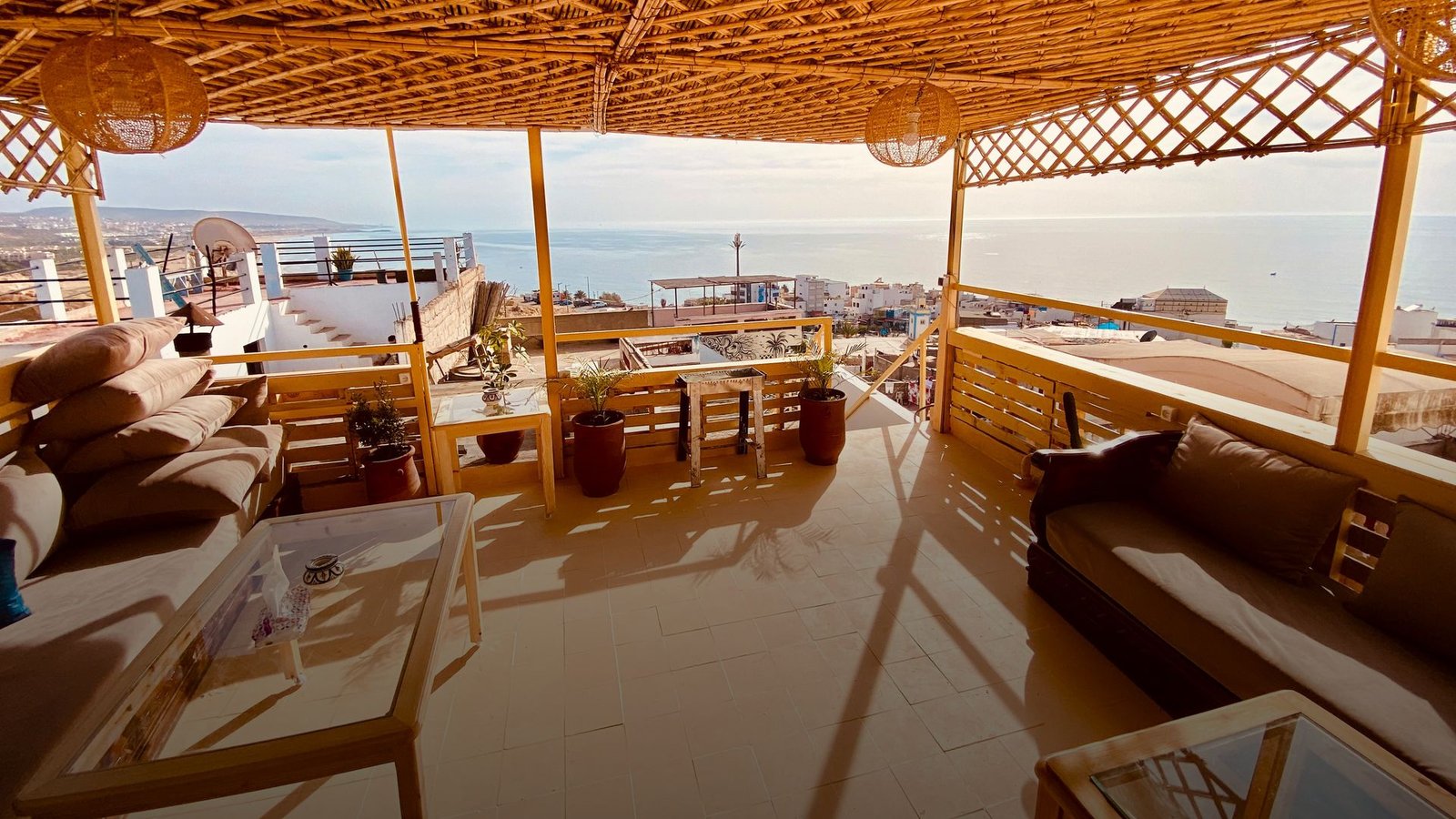 The roof terrace of our Taghazout hostel, looking out over the village to the sea